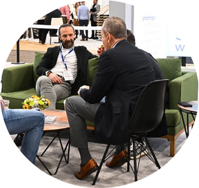 Exhibitors networking at TISE 2024