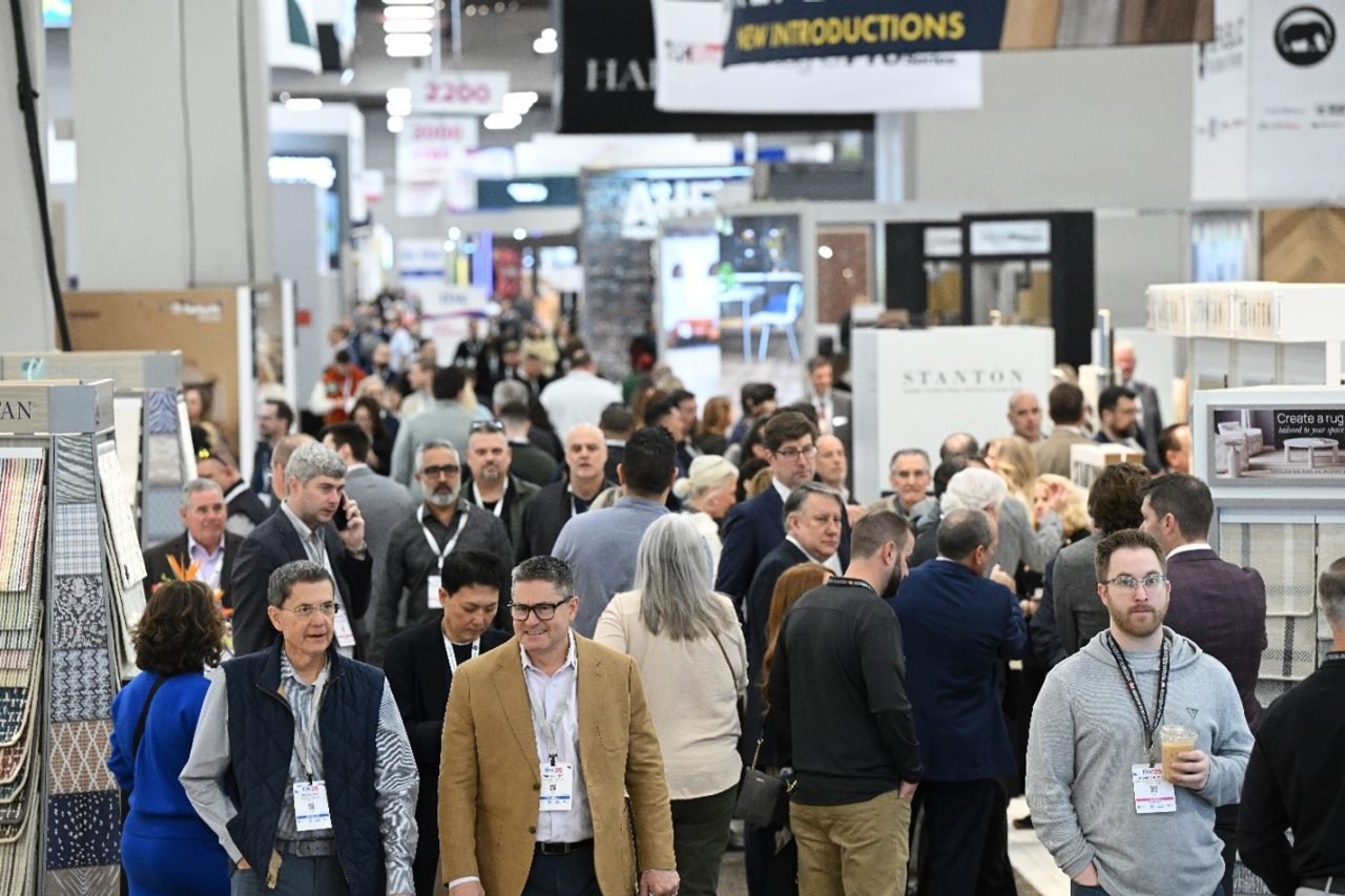 Attendees on the show floor at tise