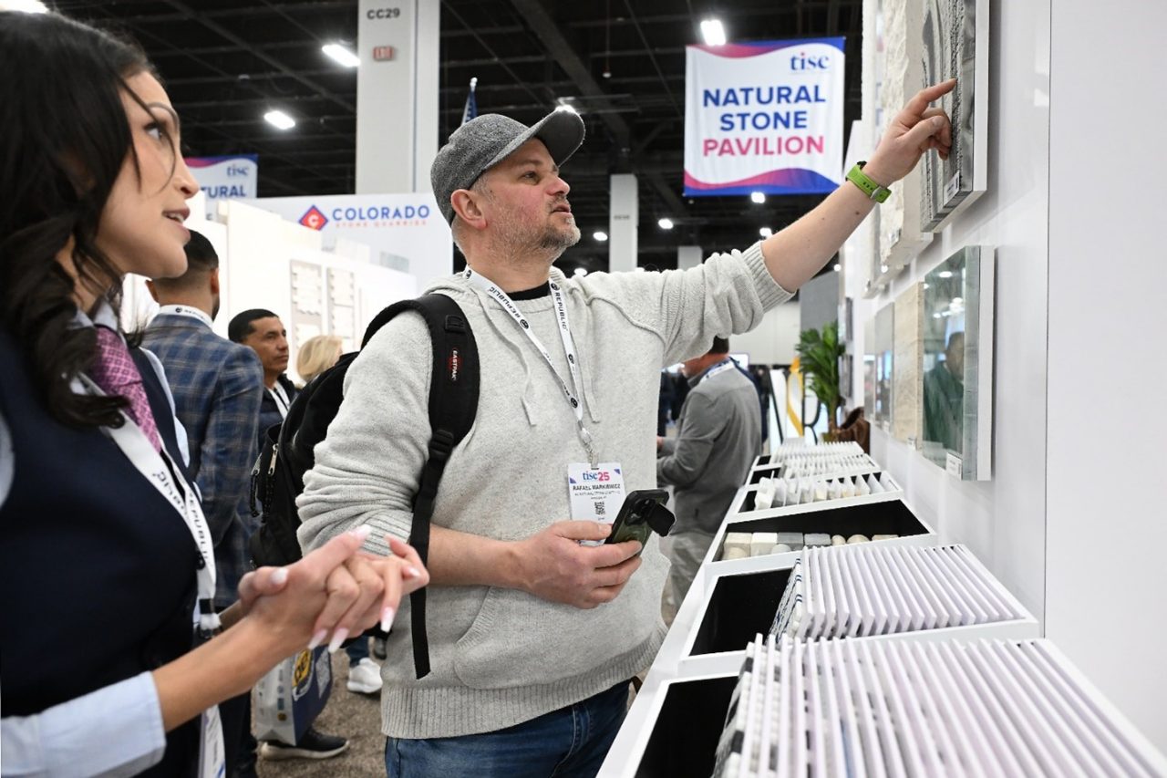 tise Attendee checking out a product