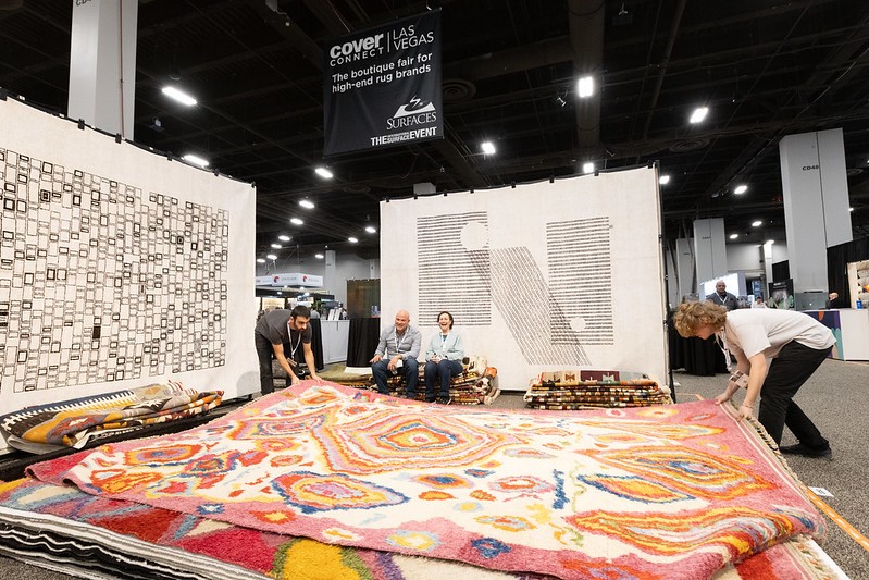 People Holding a Carpet